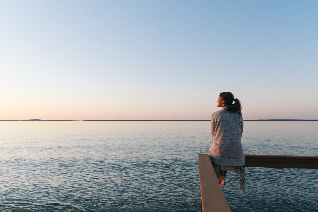 woman looking reflective